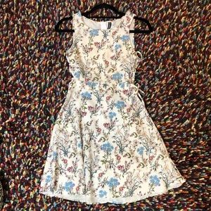 White floral spring dress with laced sides